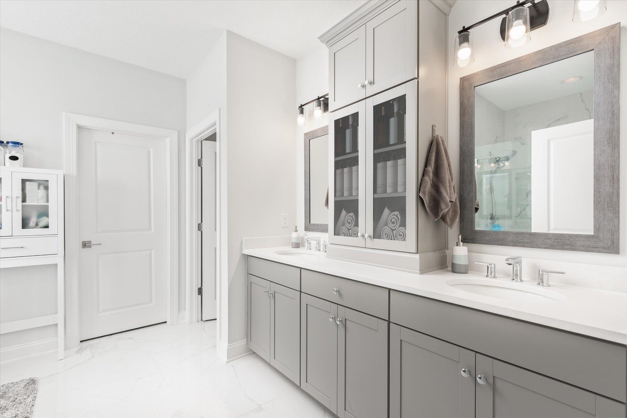 41 Cinnamon Teal Way St. Augustine, FL 32092 - Photo 27 of 60 a bathroom with a double vanity sink mirror and