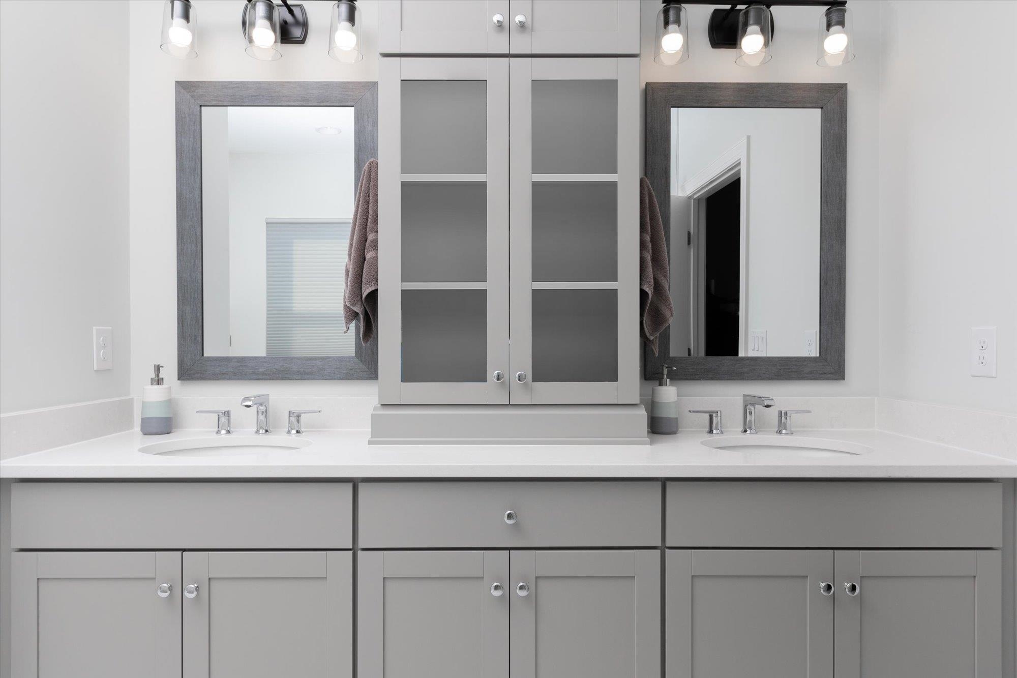 41 Cinnamon Teal Way St. Augustine, FL 32092 - Photo 30 of 60 a bathroom with double vanity sink and a mirror