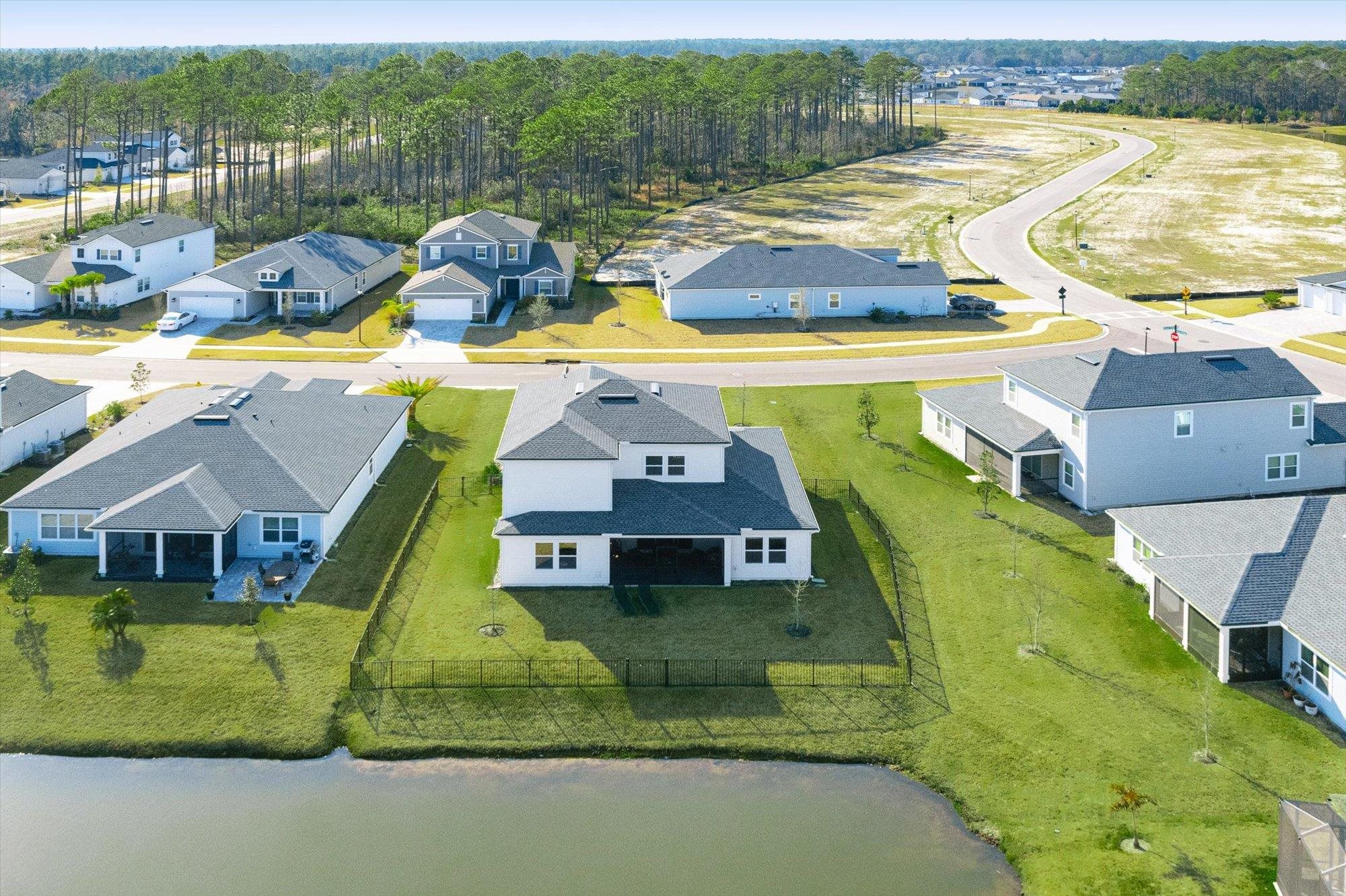 41 Cinnamon Teal Way St. Augustine, FL 32092 - Photo 44 of 60 an aerial view of a house with a swimming pool
