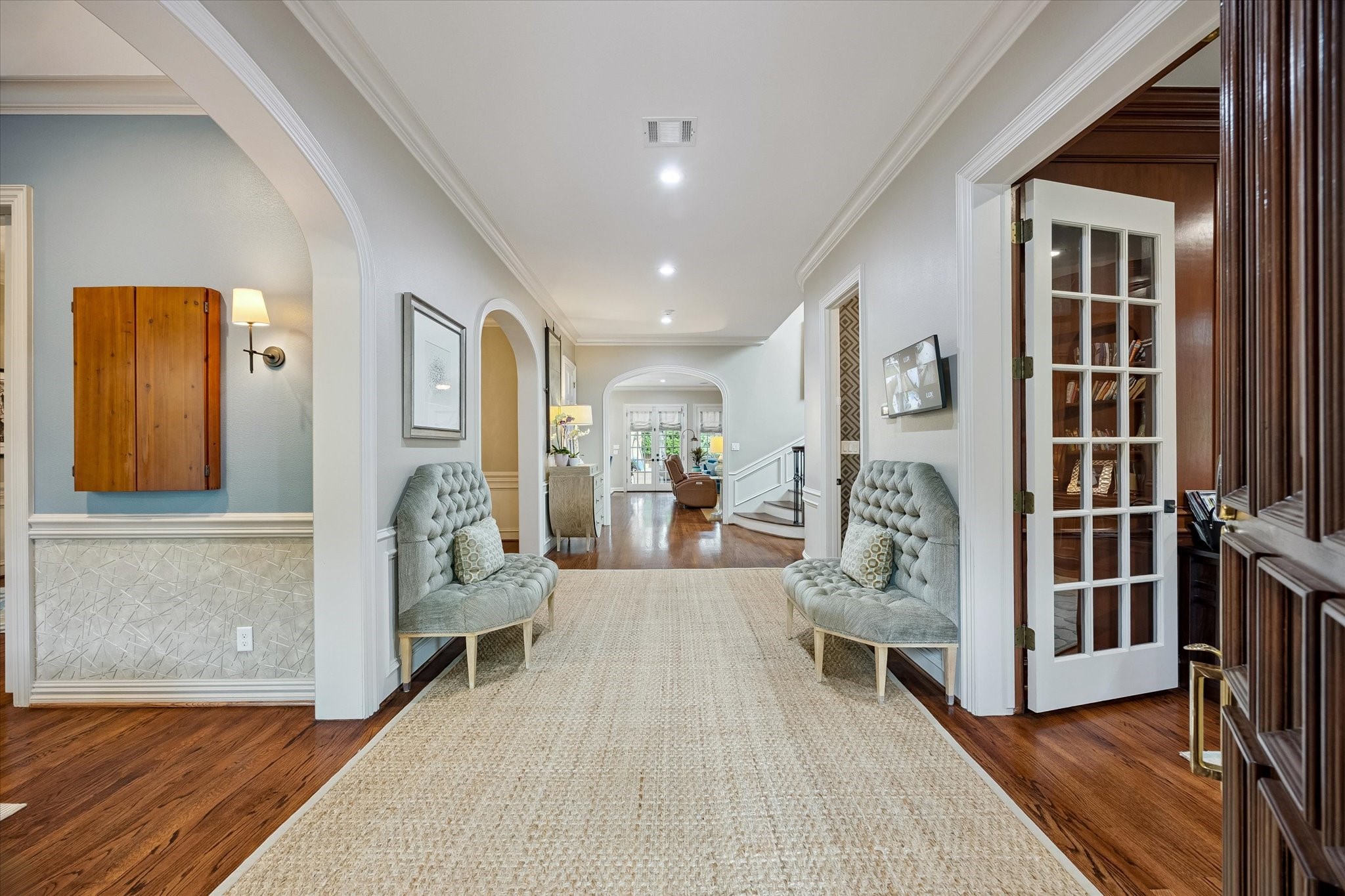 6358 Auden Street Houston, TX 77005 - Photo 4 of 50 a view of living room filled with furniture and wooden floor