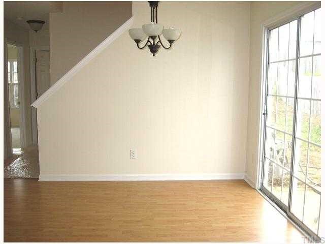 7225 Lowell Ridge Road Raleigh, NC 27616 - Photo 3 of 10 Convenient dining area with access to patio