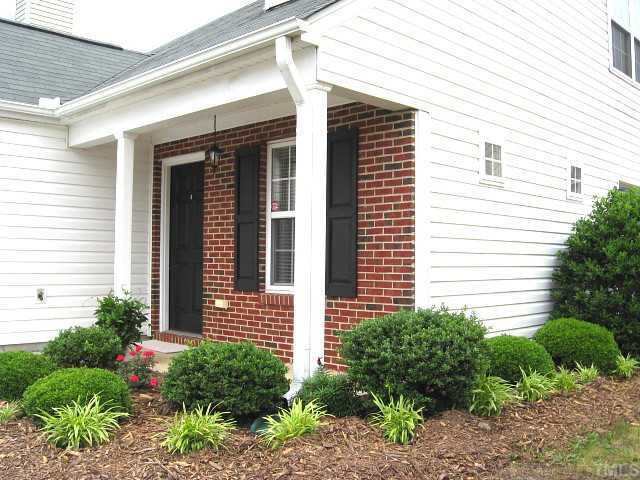7225 Lowell Ridge Road Raleigh, NC 27616 - Photo 10 of 10 Nice front porch & gorgeous landscaping