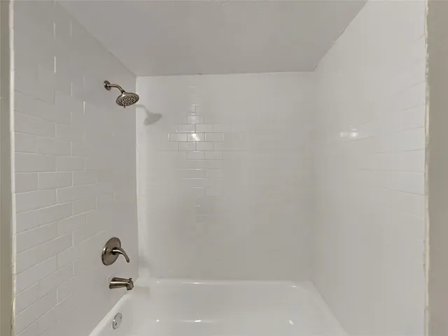 a bathroom with a bathtub