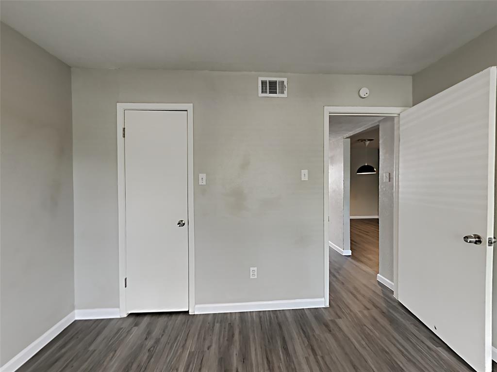 5105 Skillman Street, Unit 120E Dallas, TX 75206 - Photo 10 of 15 wooden floor & sliding glass door in a room