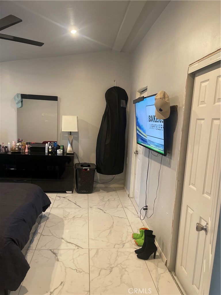 4242 Gatson Street Bakersfield, CA 93314 - Photo 4 of 5 a bathroom with a sink and a mirror