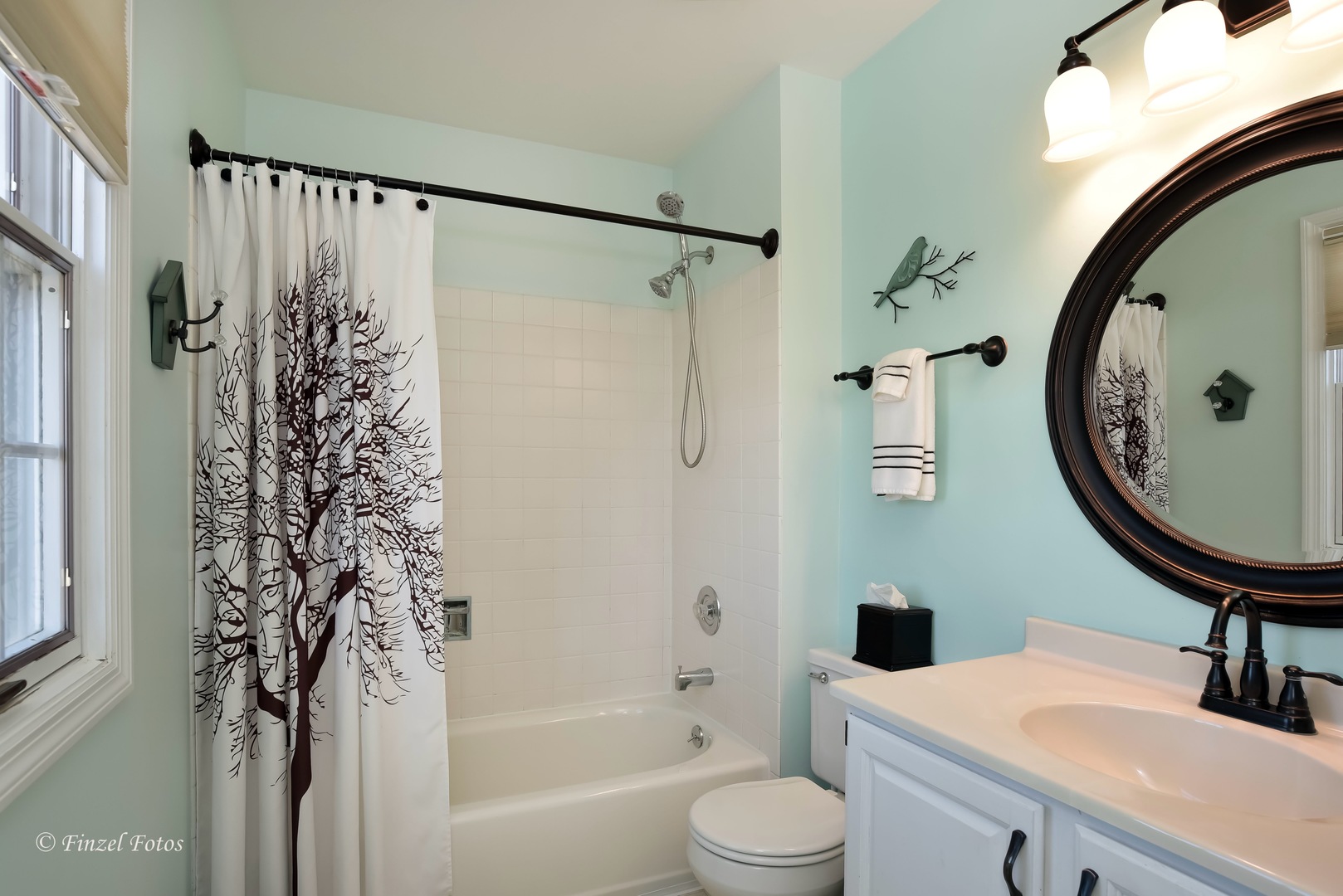 34108 Homestead Road Gurnee, IL 60031 - Photo 11 of 16 a bathroom with a sink toilet and a mirror