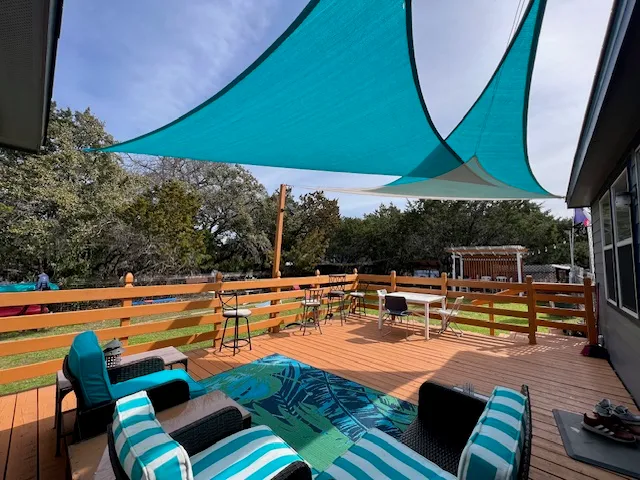 a view of a swimming pool with a patio