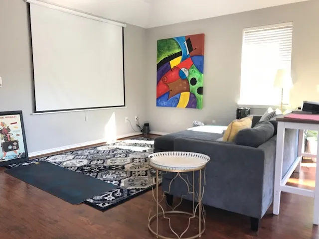 a living room with furniture and a couch