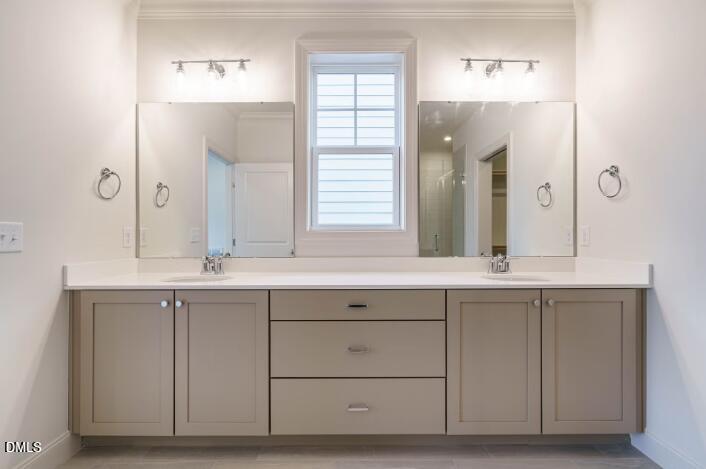 749 West Holly Springs Road Holly Springs, NC 27540 - Photo 24 of 42 a bathroom with a sink and mirror