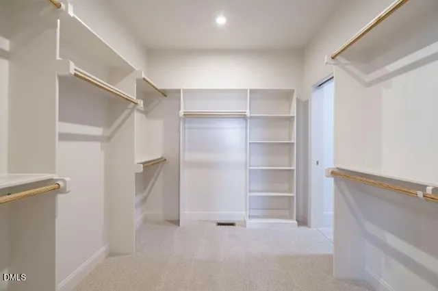 a view of an empty walk in closet