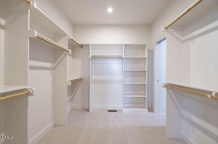 749 West Holly Springs Road Holly Springs, NC 27540 - Photo 25 of 42 a view of an empty walk in closet