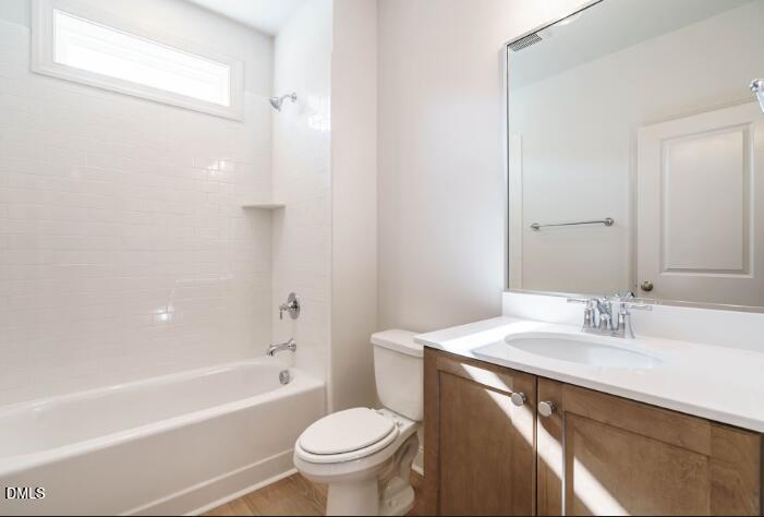 749 West Holly Springs Road Holly Springs, NC 27540 - Photo 28 of 42 a bathroom with a sink a toilet and shower
