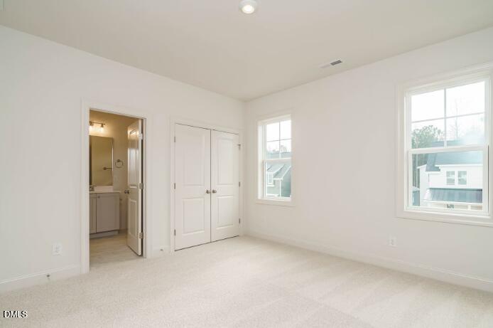 749 West Holly Springs Road Holly Springs, NC 27540 - Photo 32 of 42 a view of an empty room with a window