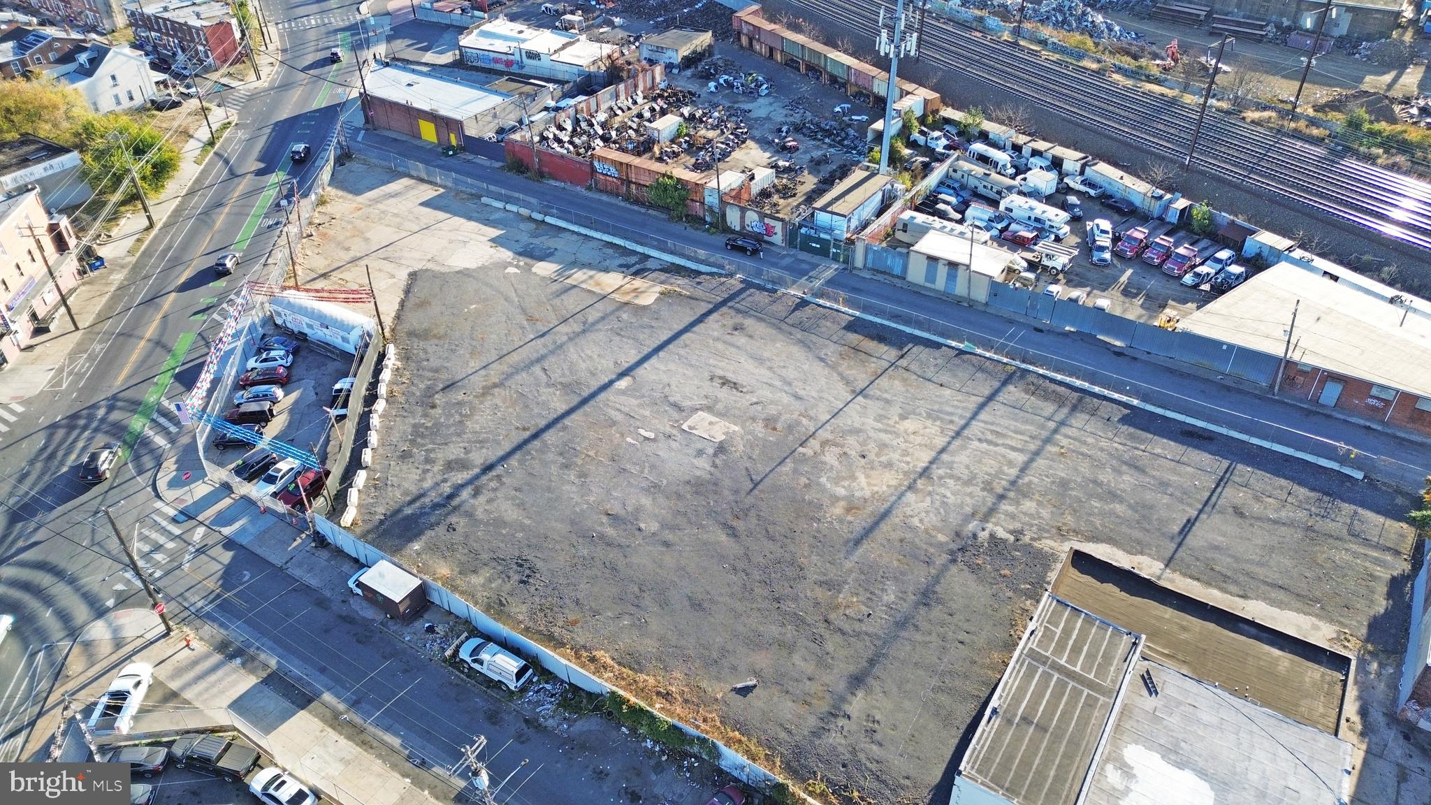 4034 Orchard Street Philadelphia, PA 19124 - Photo 2 of 6 a wooden bench sitting in front of a building