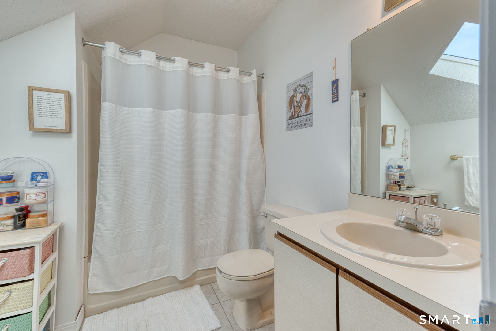 78 Silo Way, Unit 78 Bloomfield, CT 06002 - Photo 26 of 27 a bathroom with a sink toilet and shower