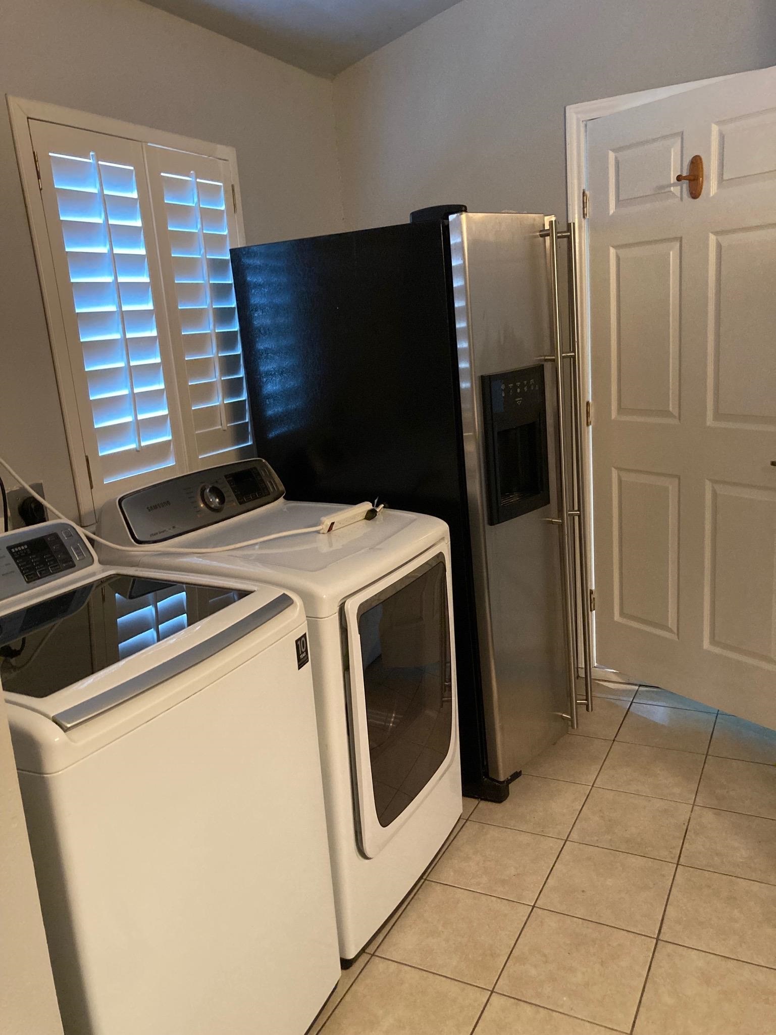215 Mountain Top Sunrise Beach, TX 78643 - Photo 23 of 29 a utility room with dryer and washer