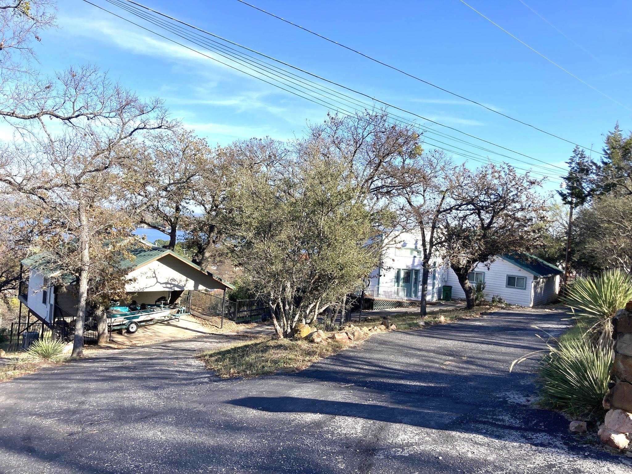 215 Mountain Top Sunrise Beach, TX 78643 - Photo 27 of 29 a view of street with houses
