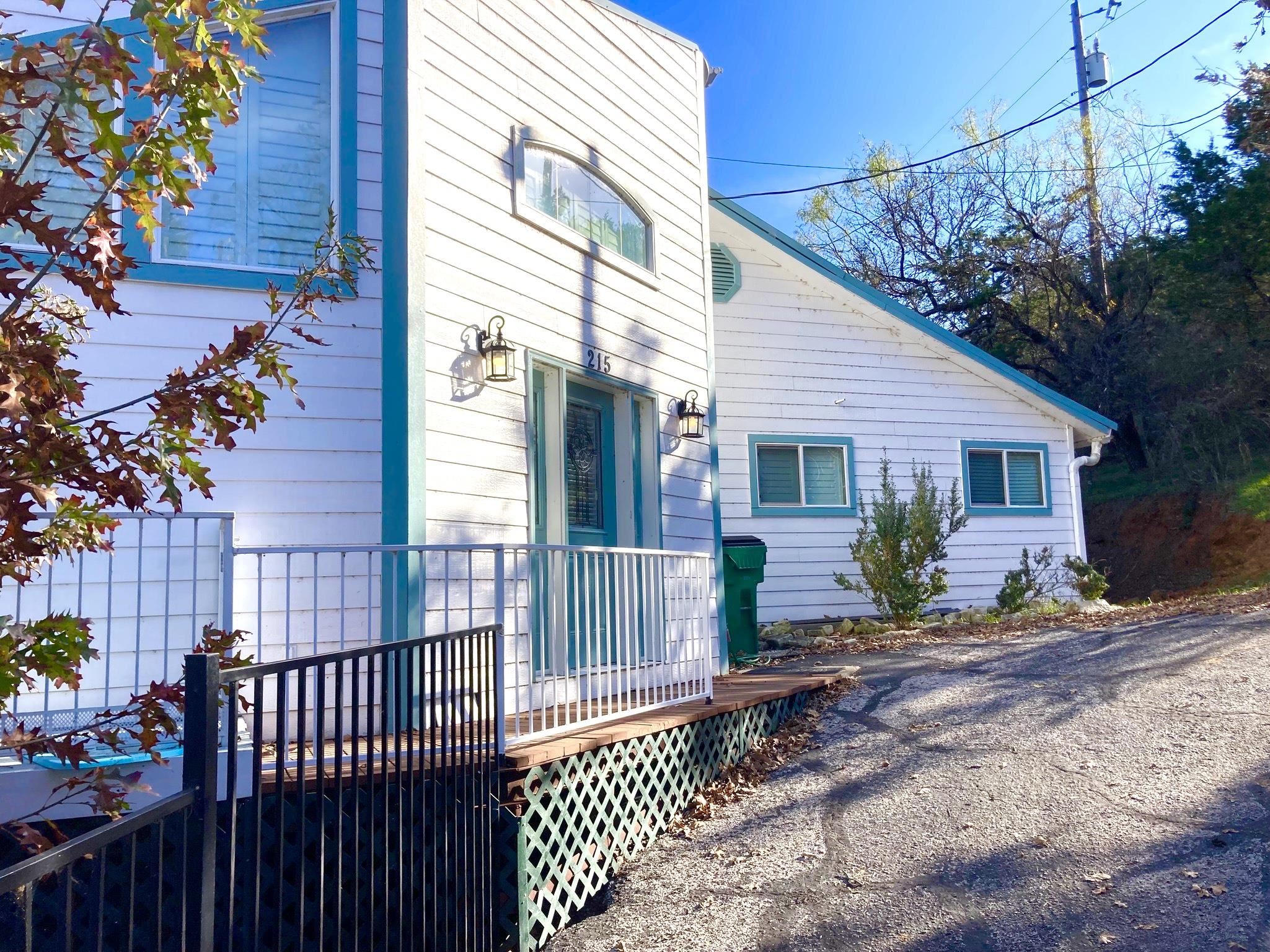 215 Mountain Top Sunrise Beach, TX 78643 - Photo 29 of 29 a front view of a house with a chair