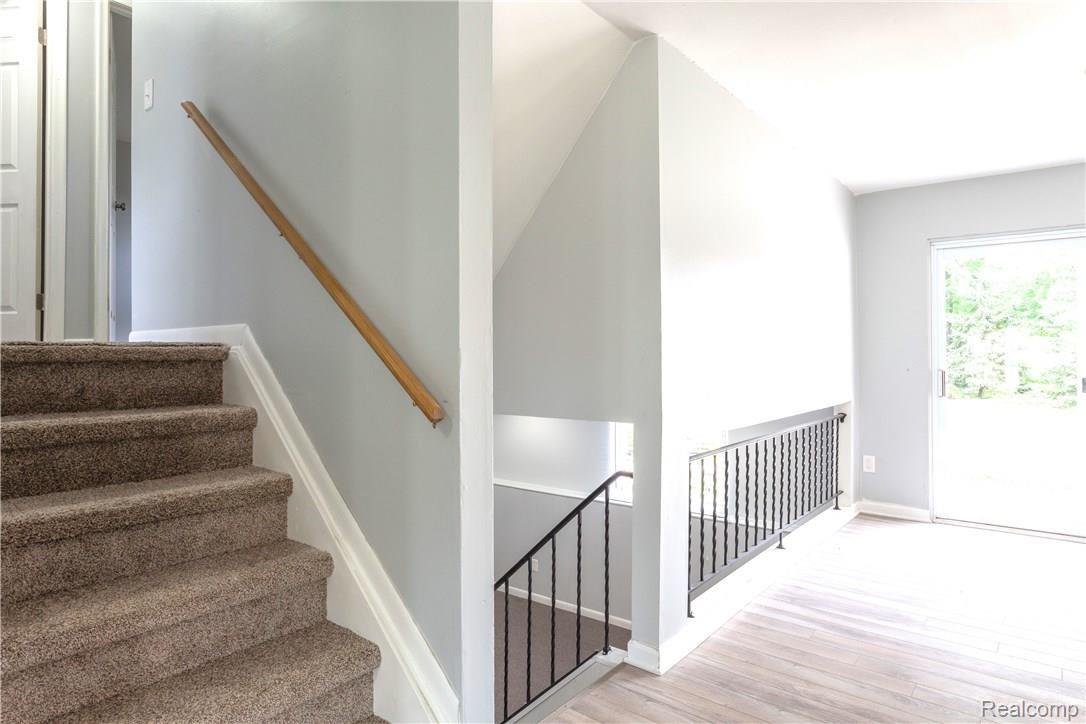 13211 Frazho Road Warren, MI 48089 - Photo 11 of 36 Stairwell entry to all four levels