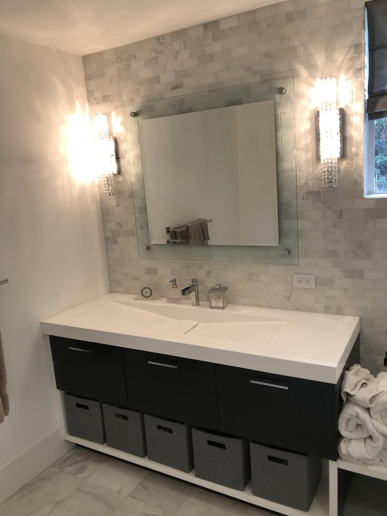 20981 Verano Way Boca Raton, FL 33433 - Photo 11 of 20 a bathroom with a sink vanity and a mirror
