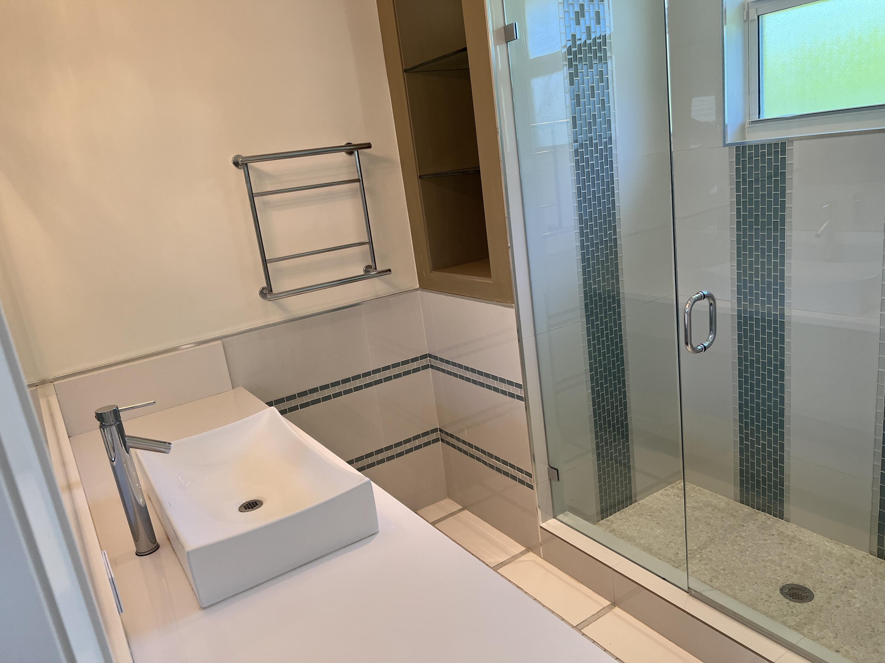 20981 Verano Way Boca Raton, FL 33433 - Photo 13 of 20 a bathroom with a bathtub and shower