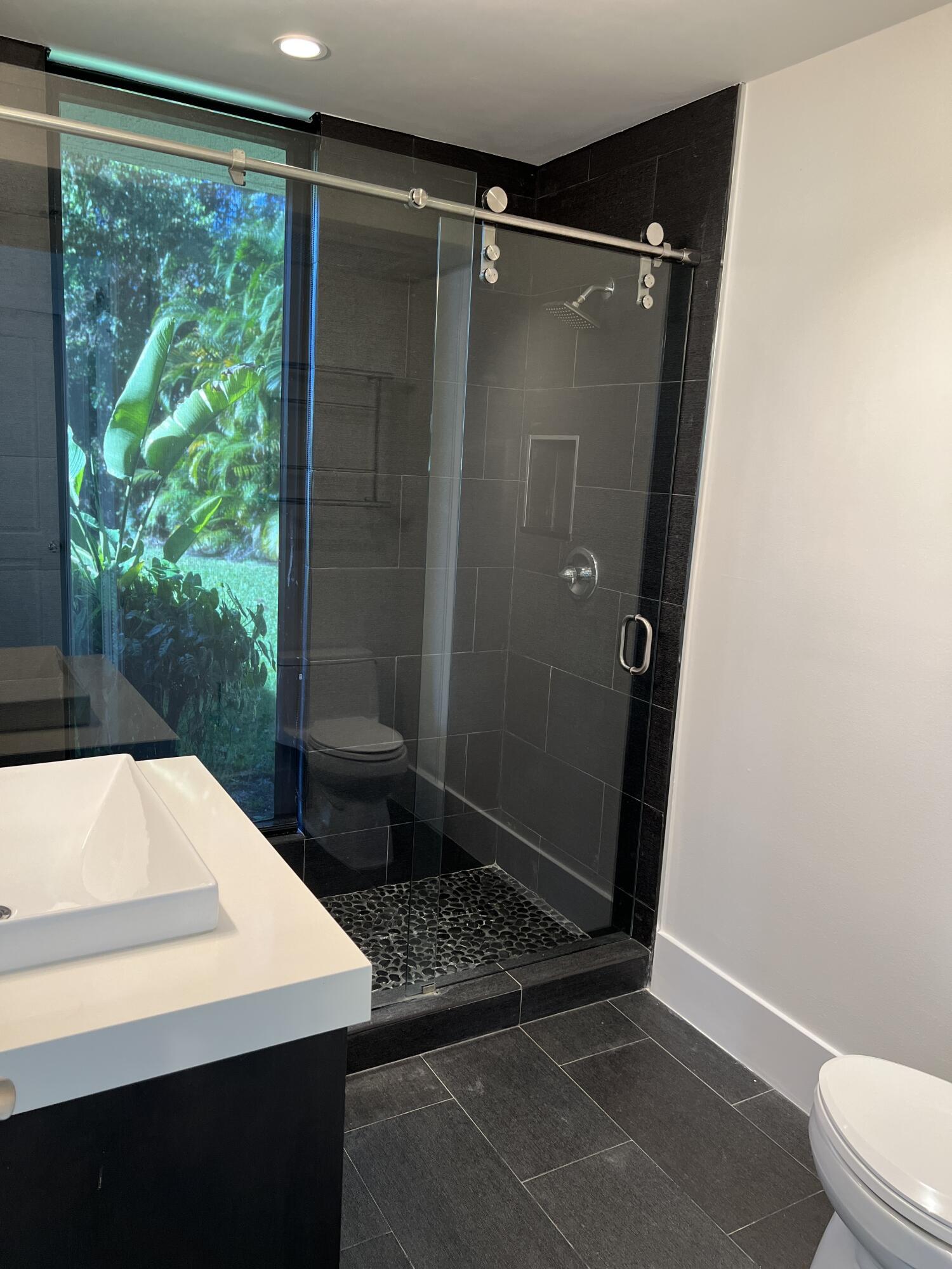 20981 Verano Way Boca Raton, FL 33433 - Photo 15 of 20 a bathroom with a shower and a toilet