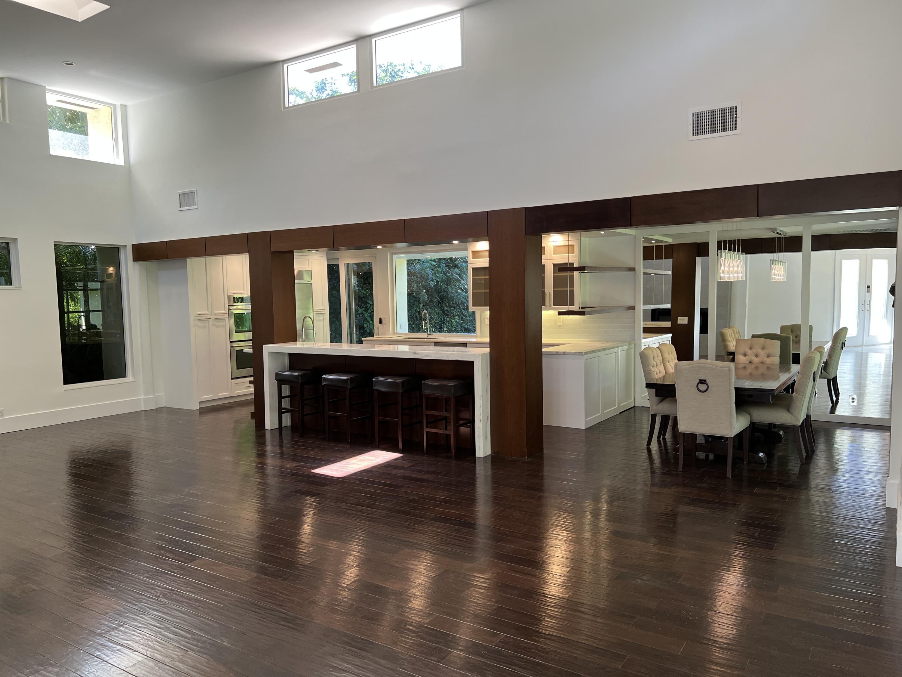 20981 Verano Way Boca Raton, FL 33433 - Photo 5 of 20 a view of a dining room with furniture window and wooden floor