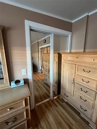 a view of a hallway with closet