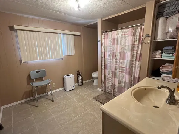 a bathroom with a sink and a toilet