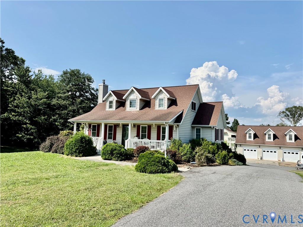 768 Hardtimes Road Farmville, VA 23901 - Photo 3 of 5 Siding exterior with dormer windows, a full-length