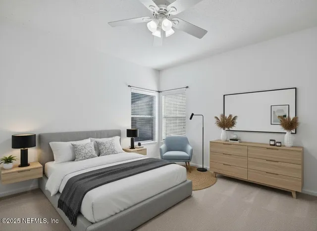 a bedroom with bed and window