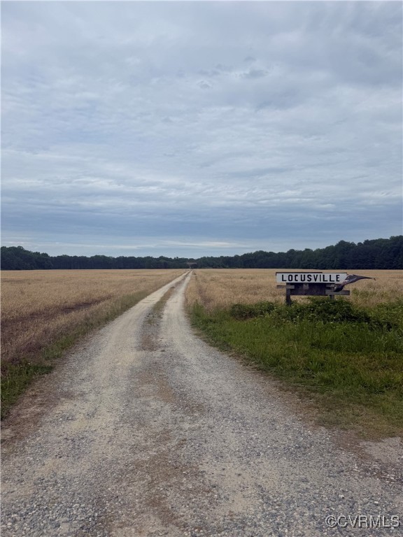 583 Slabtown Road Lancaster, VA 22503 - Photo 2 of 49 a view of a field with an ocean