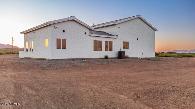 6233 West Airport Road Willcox, AZ 85643 - Photo 47 of 54 a front view of a house with a yard