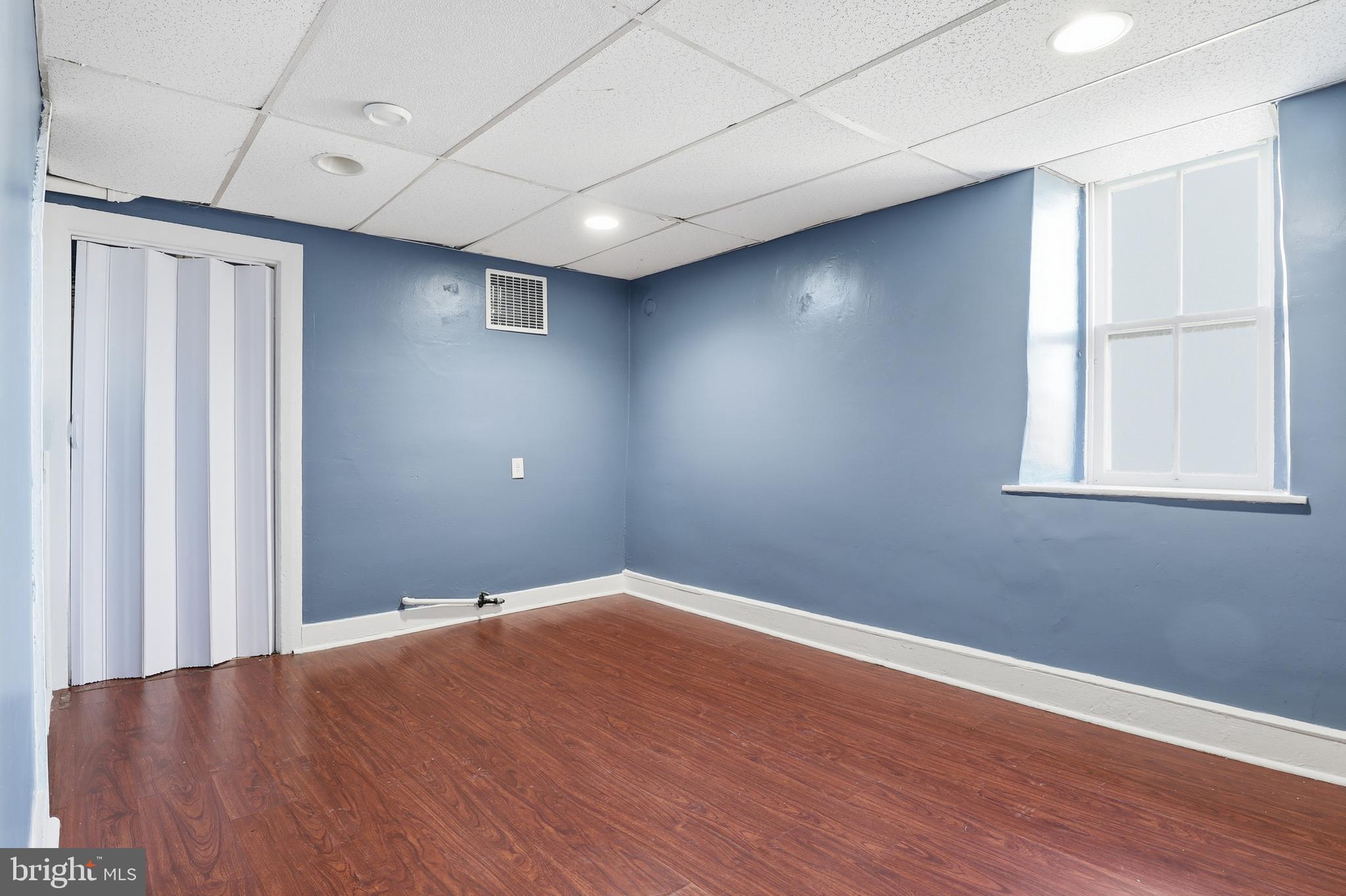 143 West Broad Street Yoe, PA 17313 - Photo 20 of 47 wooden floor in an empty room with a window