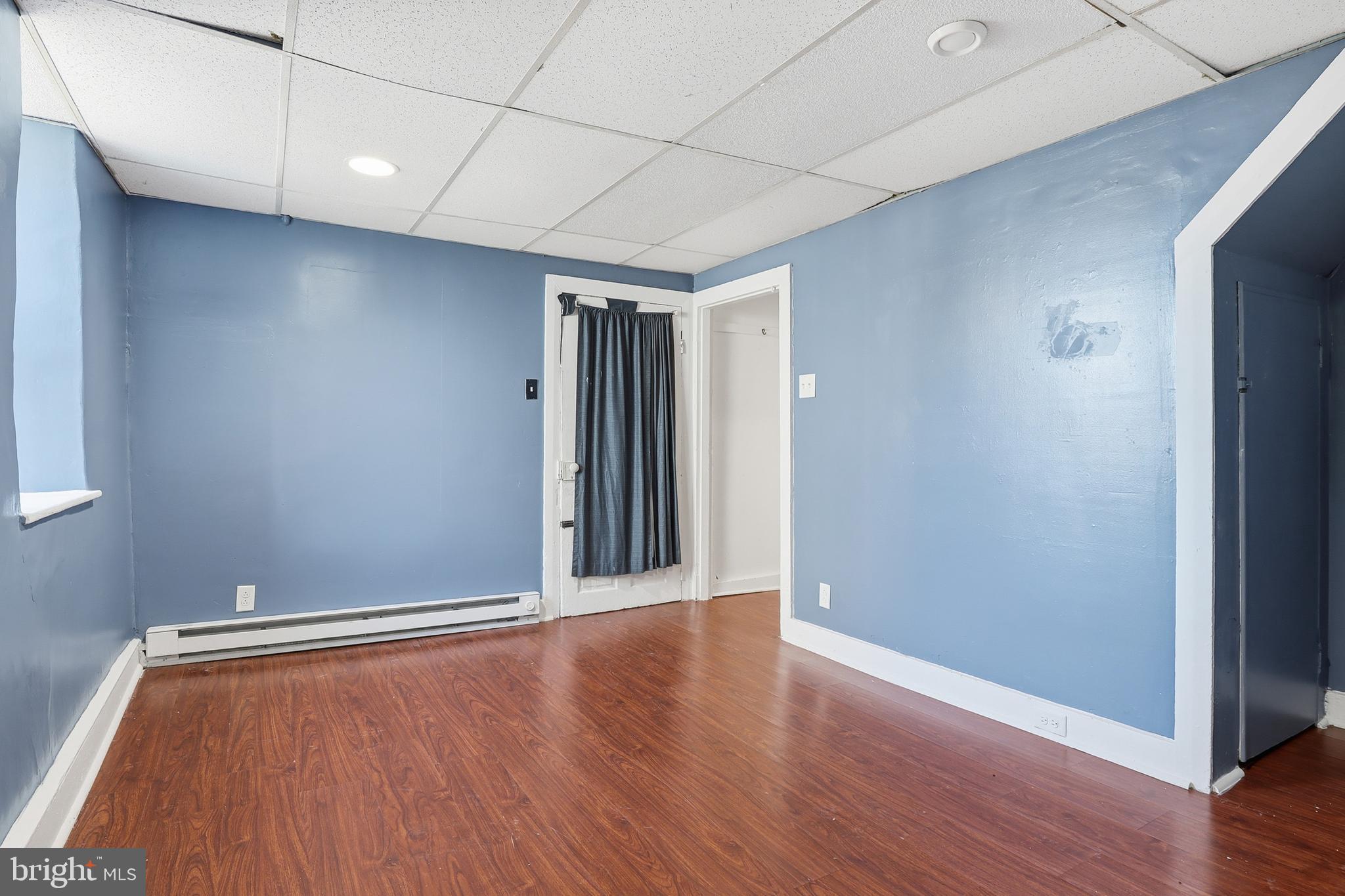 143 West Broad Street Yoe, PA 17313 - Photo 21 of 47 a view of an empty room with wooden floor