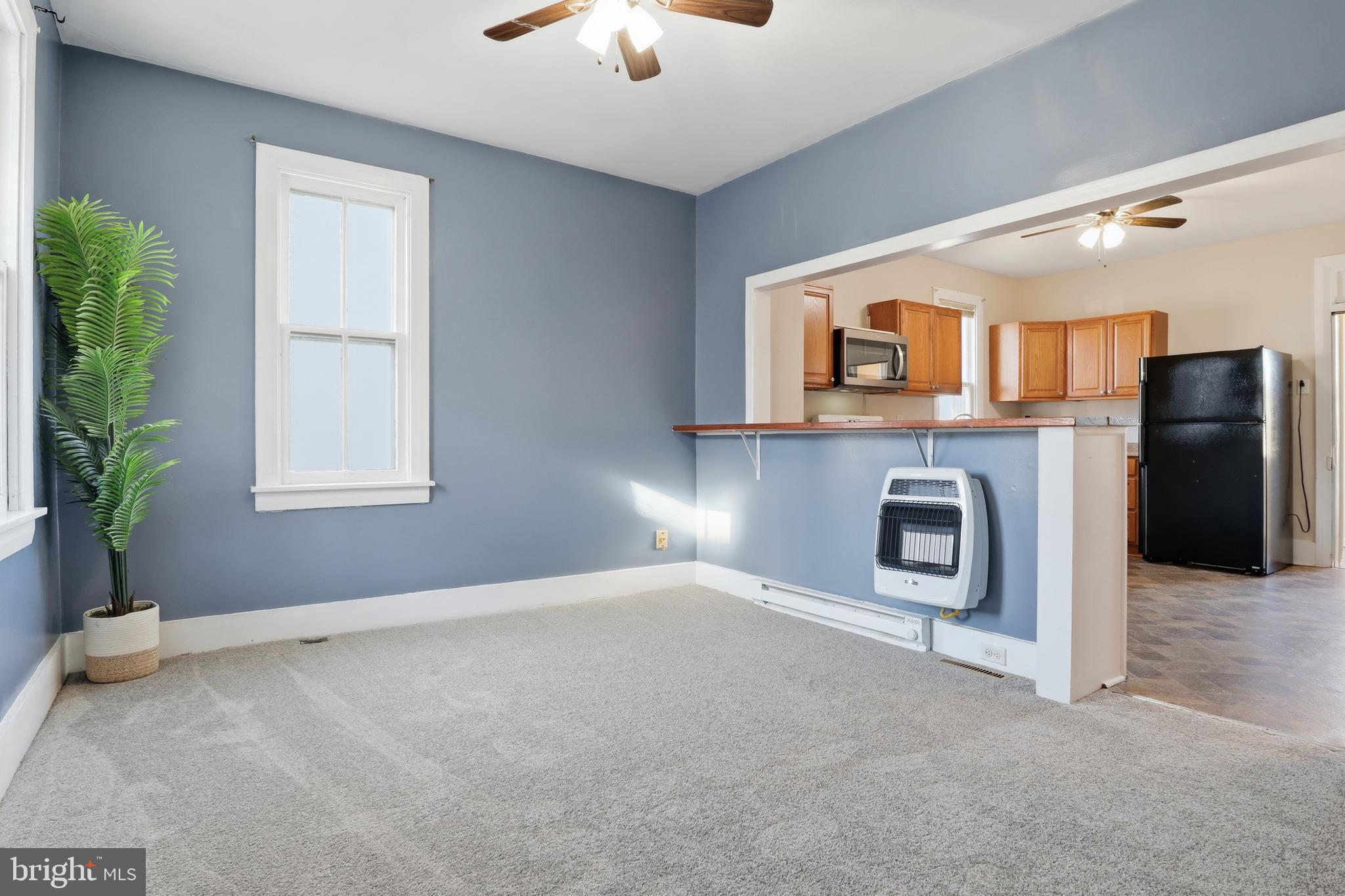 143 West Broad Street Yoe, PA 17313 - Photo 5 of 47 a view of a livingroom with a fireplace