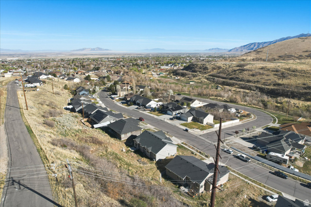 45 Memory Lane Tooele, UT 84074 - Photo 28 of 30 Aerial perspective of suburban area with a mountain backdrop
