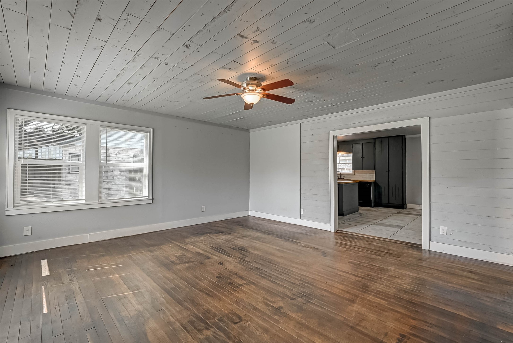 1018 West Sealy Street Alvin, TX 77511 - Photo 2 of 16 a view of an empty room with a window
