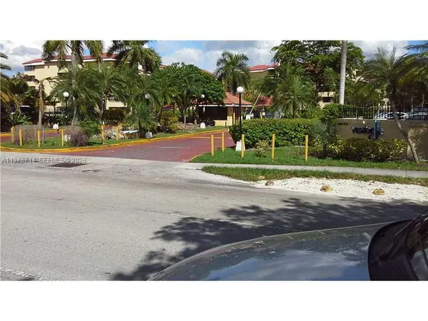 a black and white photo of a road