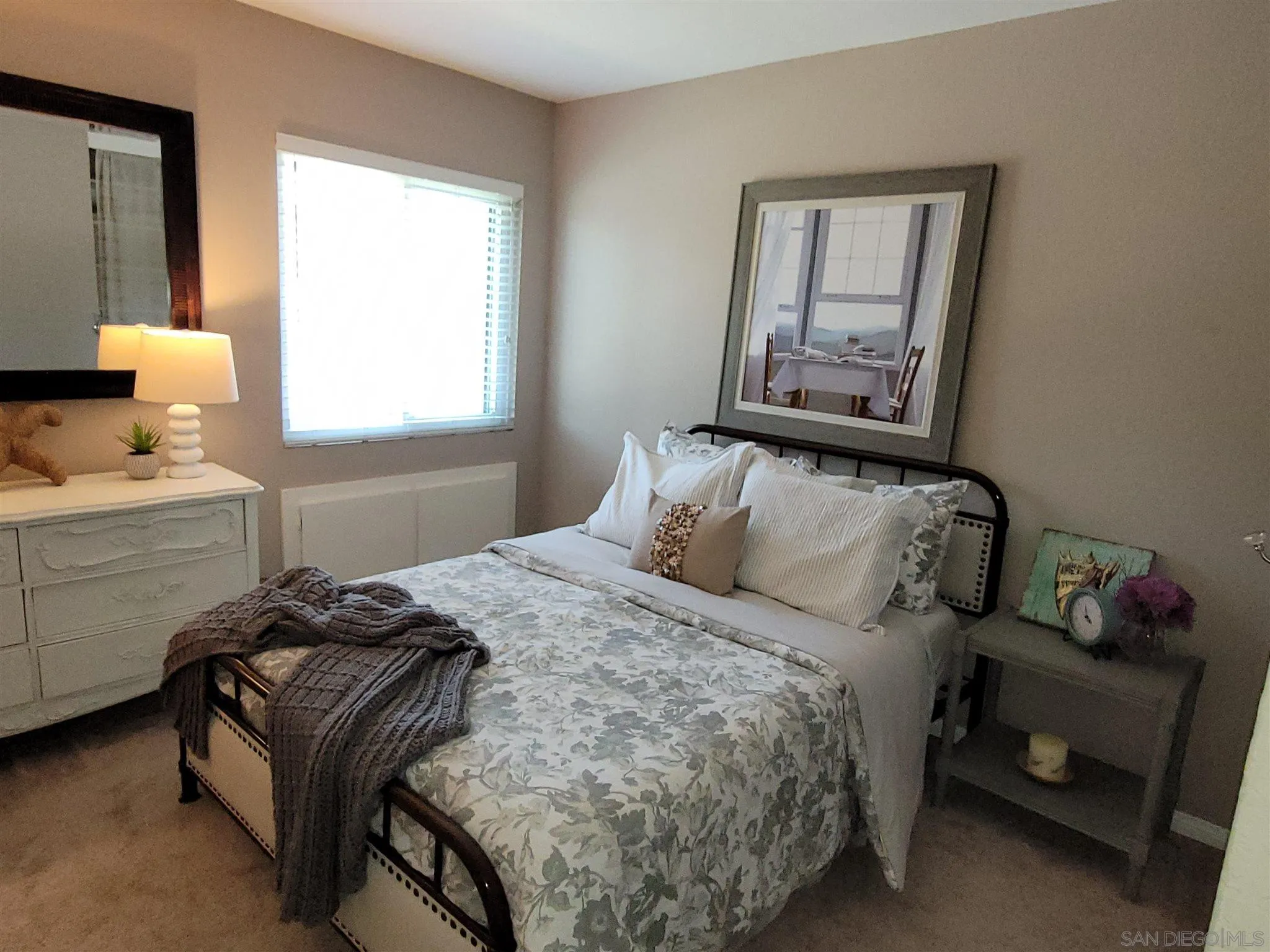 5605 Friars Road, Unit 285 San Diego, CA 92110 - Photo 7 of 11 a bedroom with a bed and window