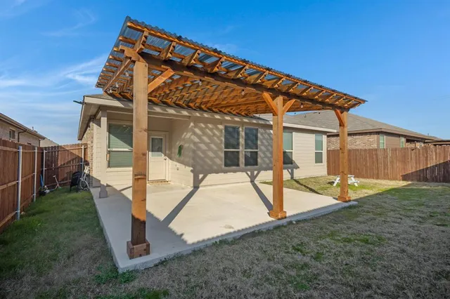 front view of a house with a big yard