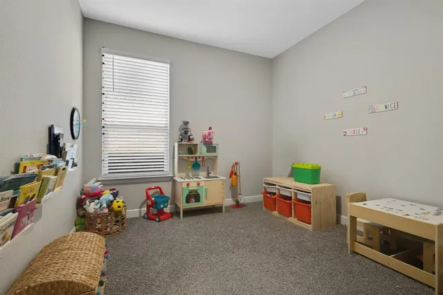 a room with toys and a couch