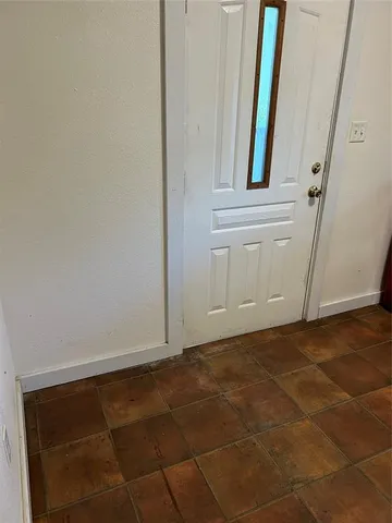 a house with trees in front of it