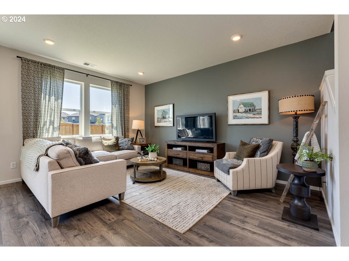 2993 V Street Springfield, OR 97477 - Photo 11 of 24 a living room with furniture and a flat screen tv