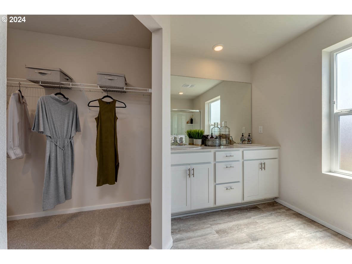 2993 V Street Springfield, OR 97477 - Photo 24 of 24 a bathroom with a double vanity sink and mirror