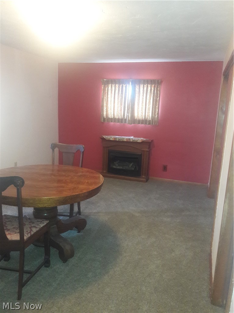 13745 Hathaway Road Garfield Heights, OH 44125 - Photo 3 of 16 Gas fireplace offer a cozy atmosphere during cold weather!