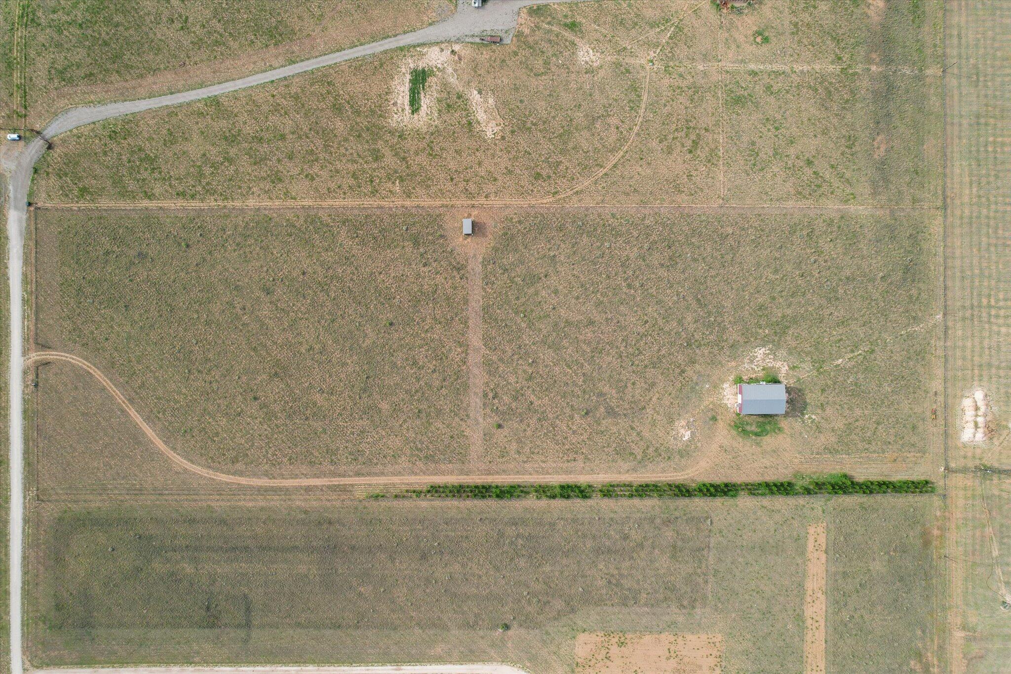 767 North Sandhill Road Tahoka, TX 79373 - Photo 2 of 27 a bathroom with a shower