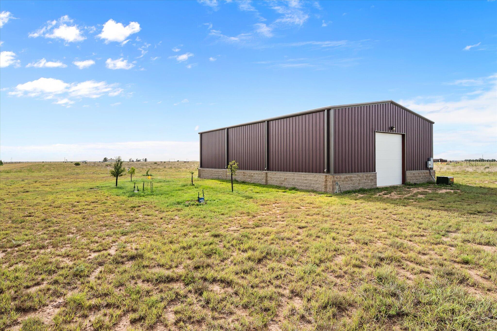 767 North Sandhill Road Tahoka, TX 79373 - Photo 24 of 27 a view of a backyard