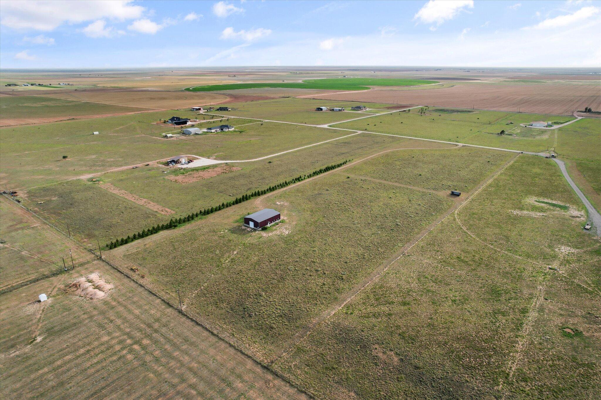 767 North Sandhill Road Tahoka, TX 79373 - Photo 4 of 27 a view of an outdoor space and tennis court