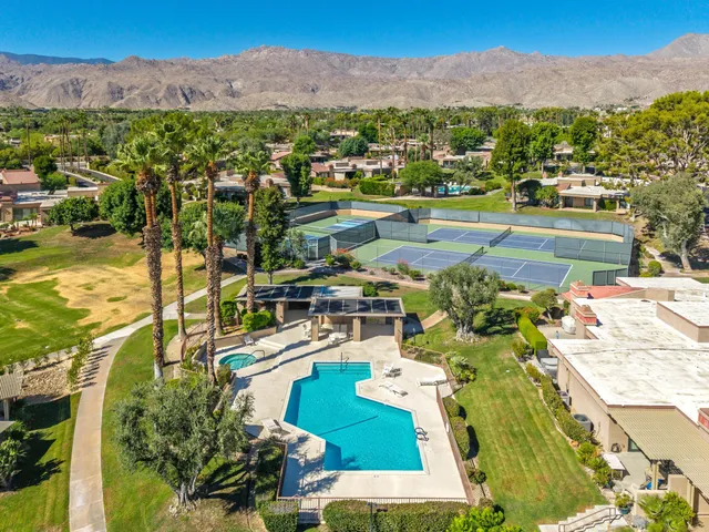a view of a city with a lake